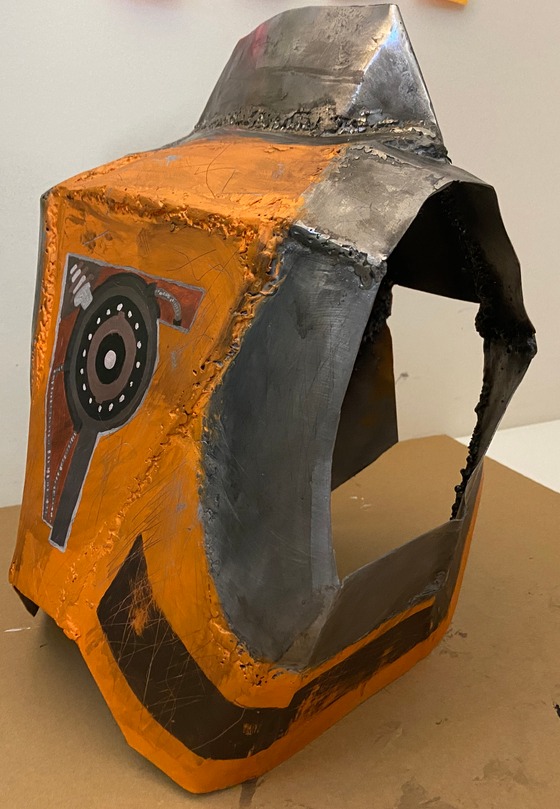 I made the chest plate for the HEV suit in my metal shop class. Ignore the horrible welding